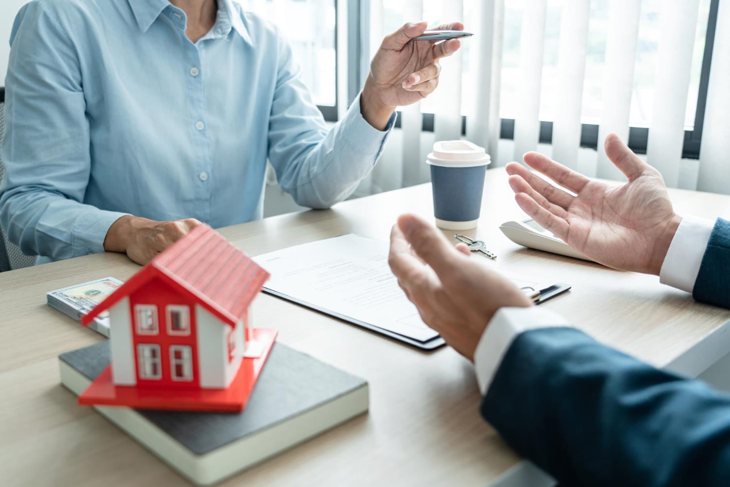 Real estate broker agent consulting the customer to a decision making sign